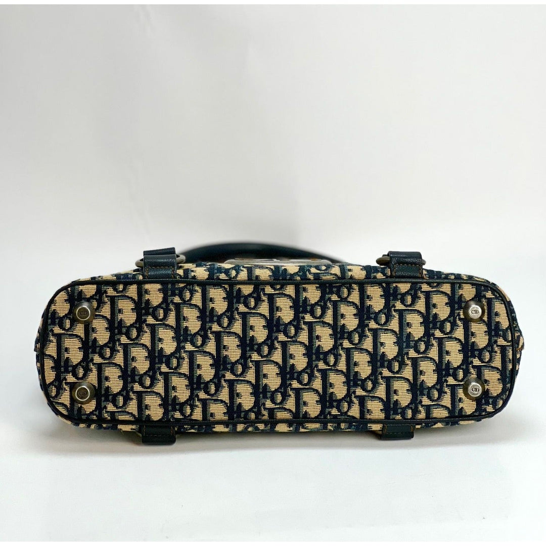 Bottom view of CHRISTIAN DIOR Monogram Trotter CD Blue Canvas Hand Bag showcasing the luxurious pattern and design.