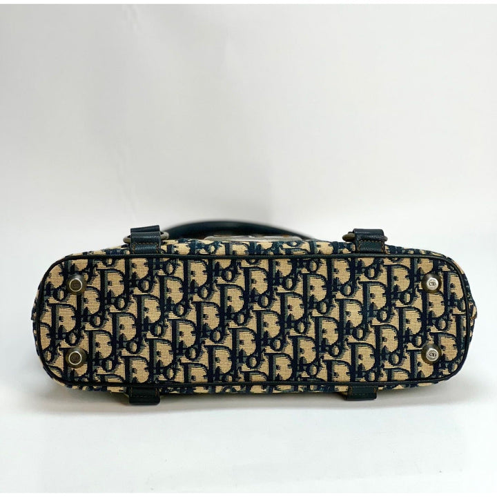 Bottom view of CHRISTIAN DIOR Monogram Trotter CD Blue Canvas Hand Bag showcasing the luxurious pattern and design.