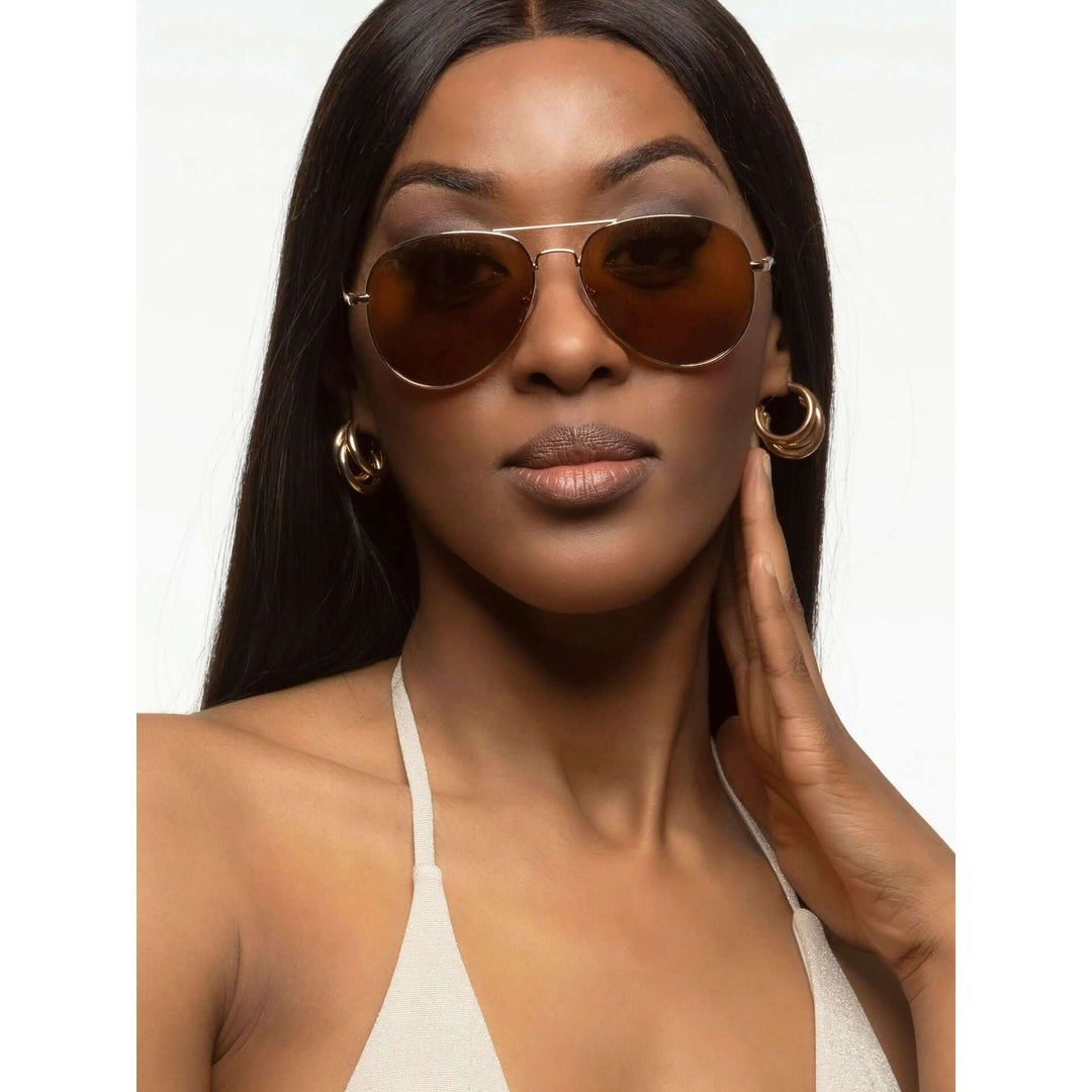Twig men's and women's sunglasses in assorted styles including aviator, round, and square frames