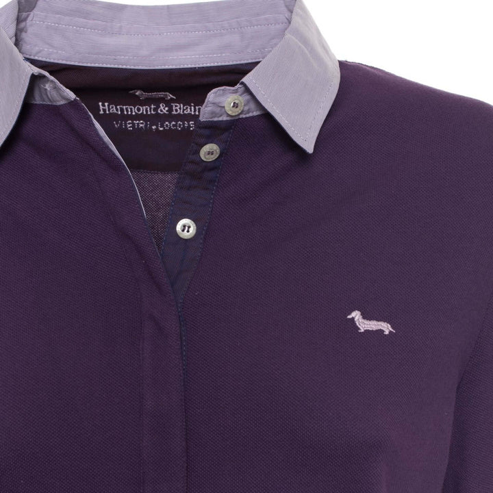 Purple polo shirt with a collar and logo on a white background