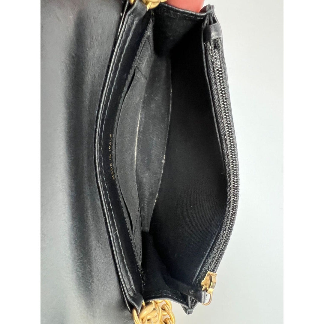 Interior view of Chanel Caviar Quilted Mini Boy Clutch Wallet on a Chain Black, showing the zipper compartment.