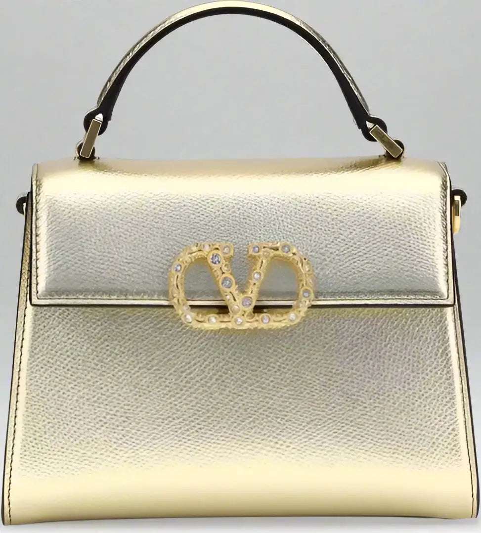Valentino Garavani clothing, designer bags, and accessories collection at STORE 7994