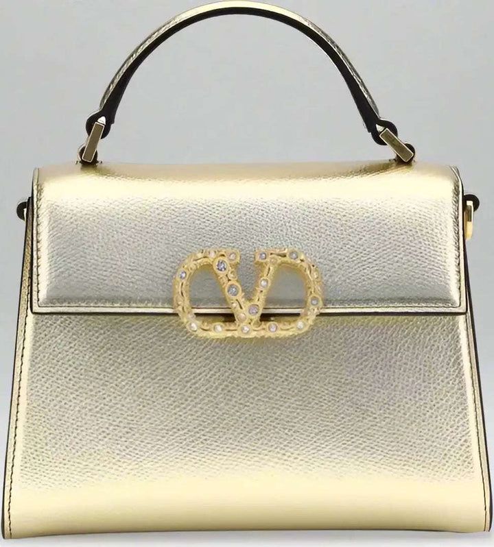 Valentino Garavani clothing, designer bags, and accessories collection at STORE 7994