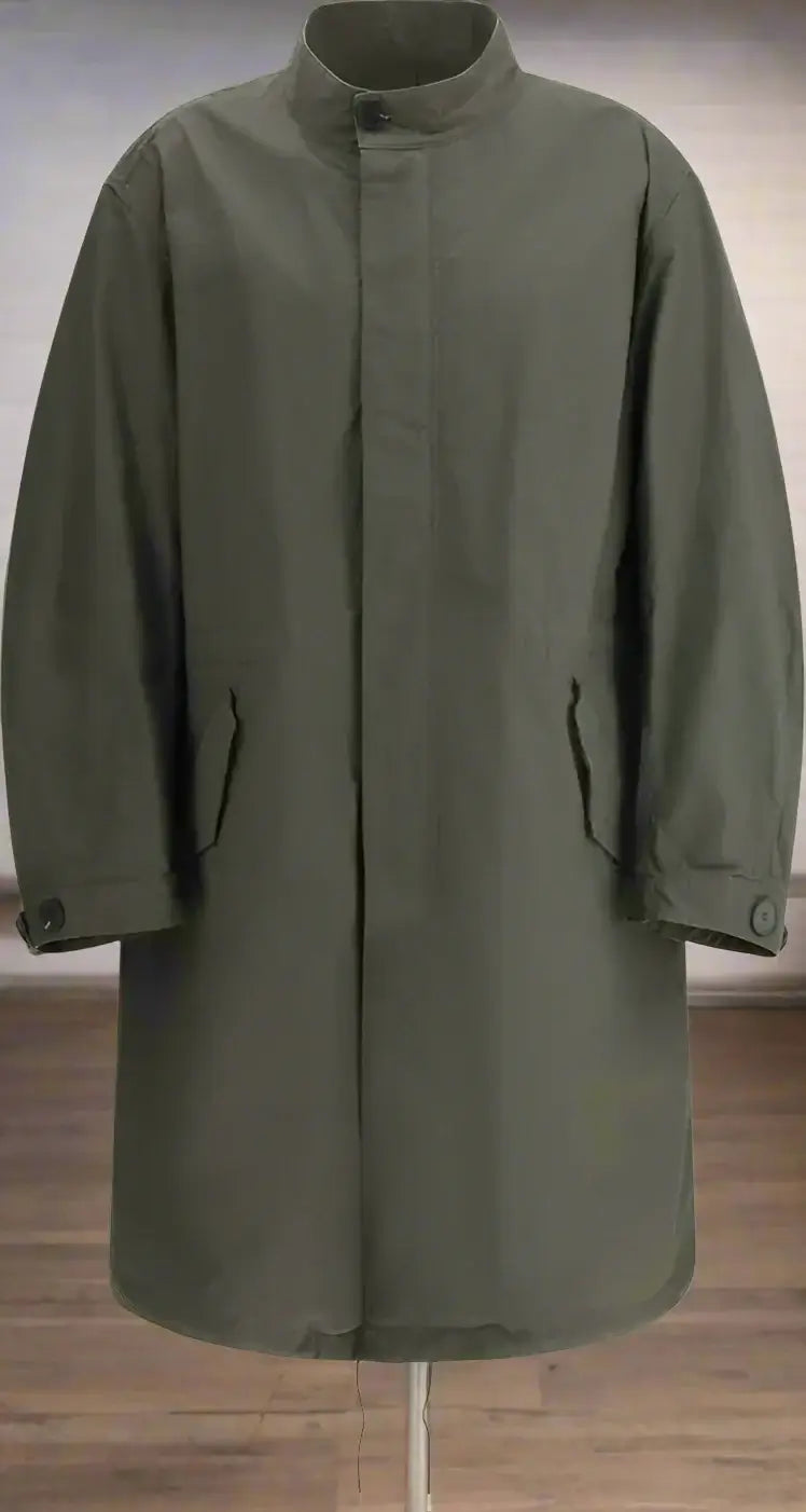 Green raincoat on a white background