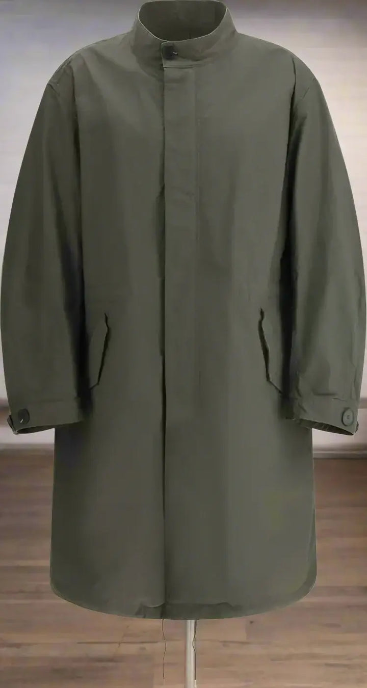 Green raincoat on a white background
