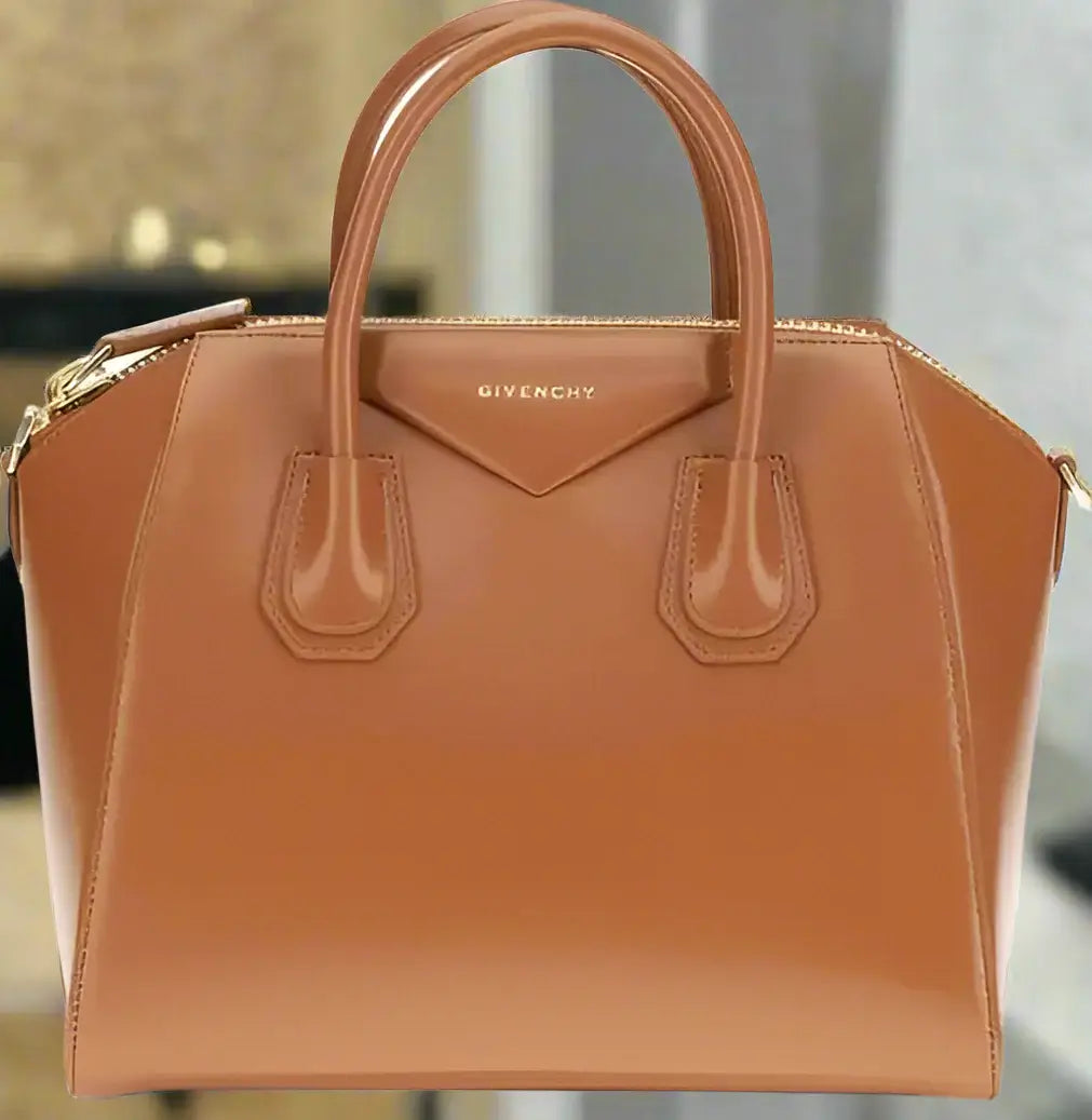 Brown Givenchy handbag on a white background