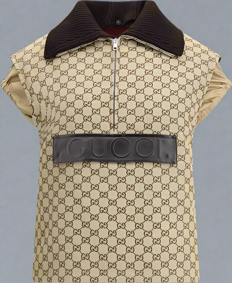Beige patterned vest with black collar and Gucci logo on a white background