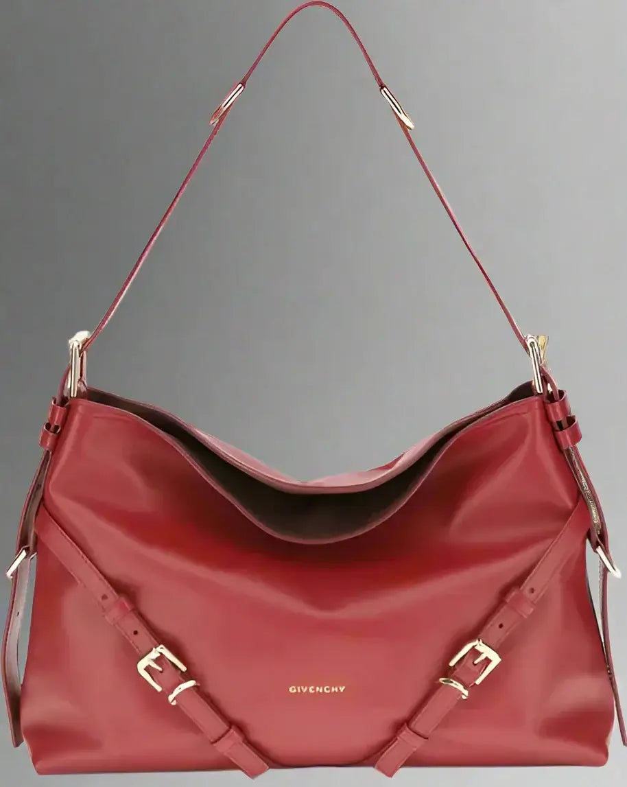 Red handbag with Givenchy logo on a white background