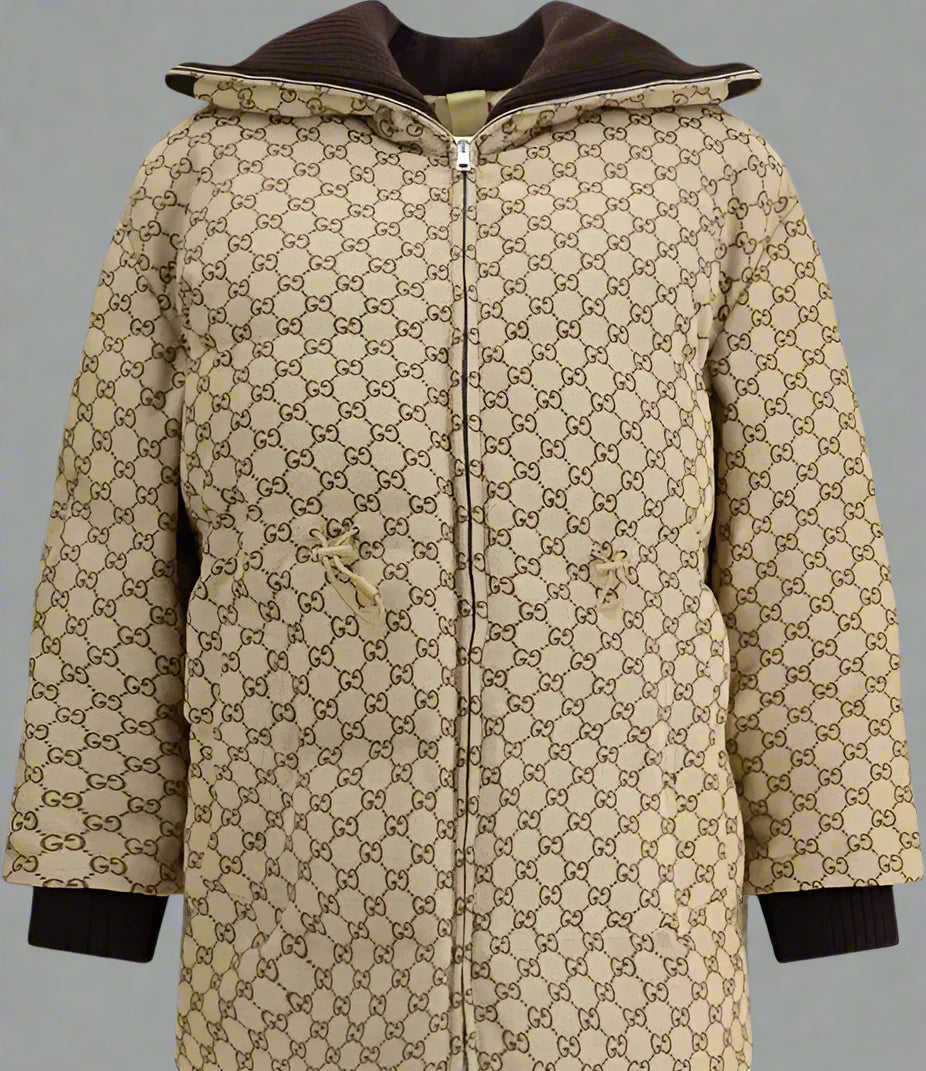 Beige coat with brown accents and a pattern on a white background