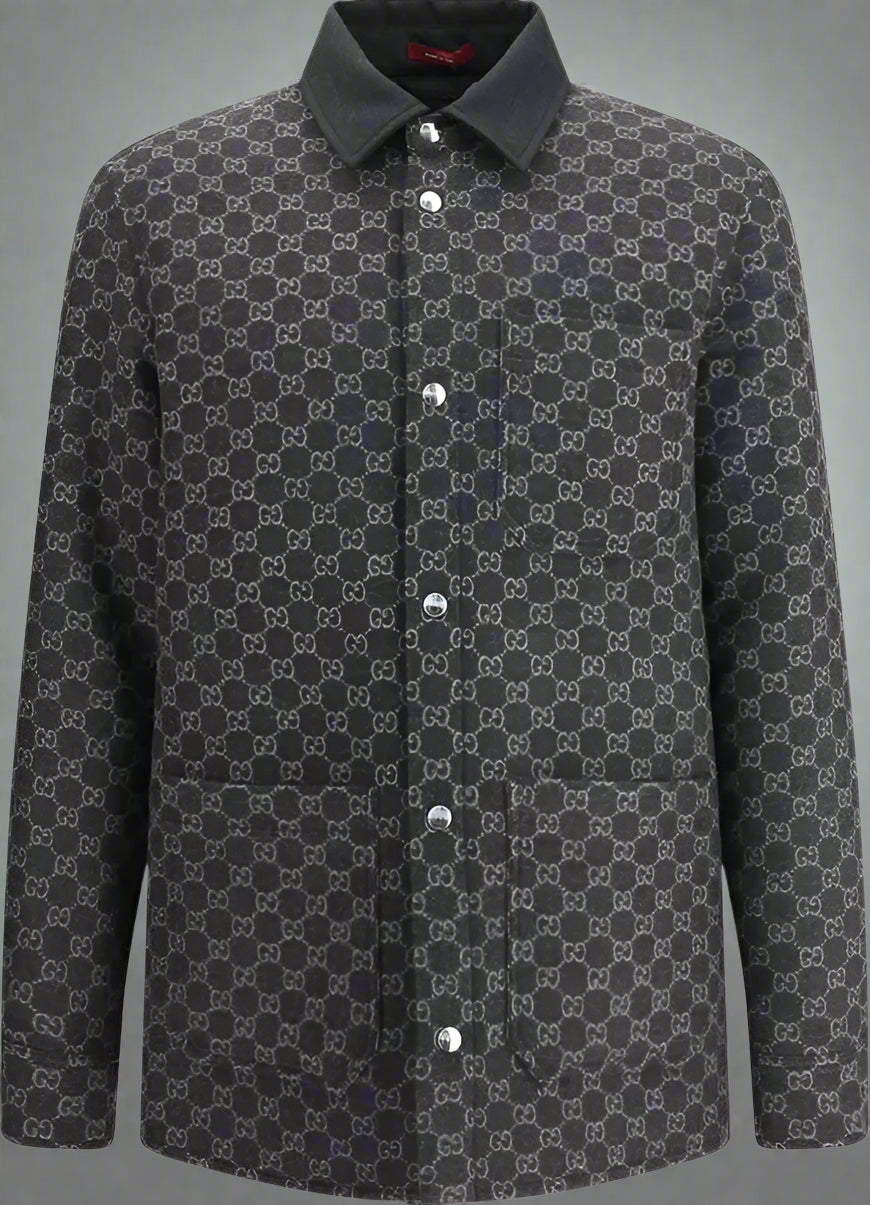 Dark gray patterned shirt with buttons on a white background