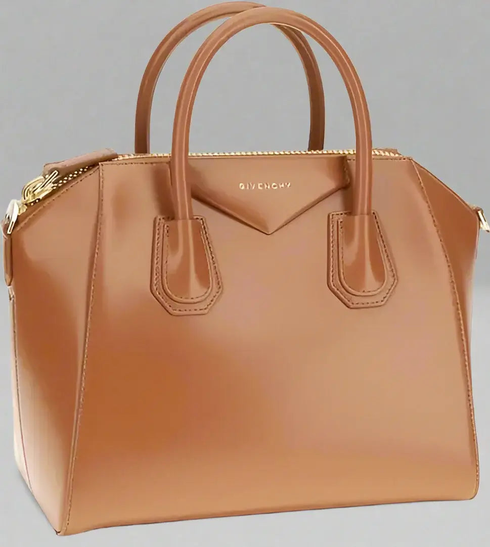 Brown handbag with Givenchy logo on a white background