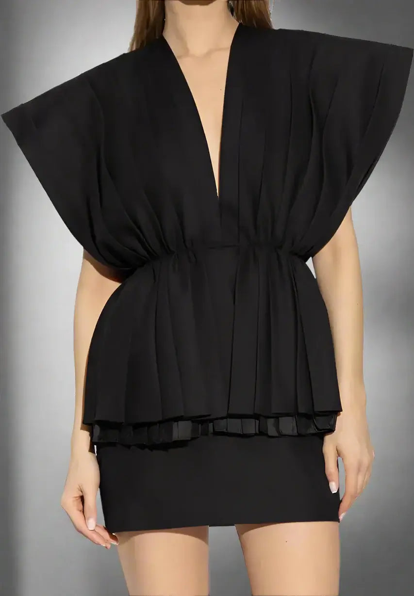 Black dress with ruffled sleeves on a white background