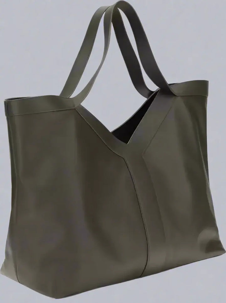 Black leather tote bag on a white background