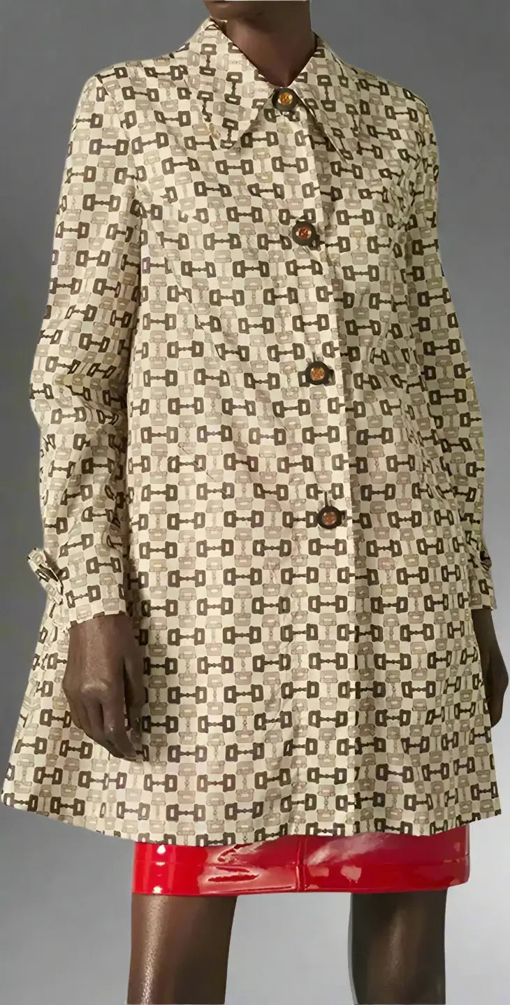 Patterned coat with red skirt on a white background