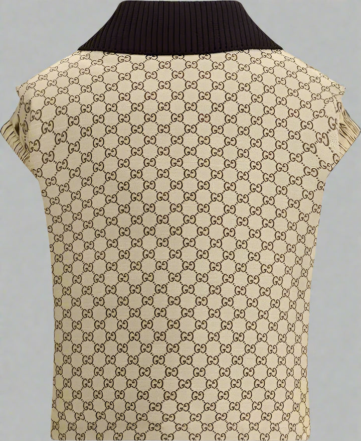 Beige patterned vest with black collar on a white background
