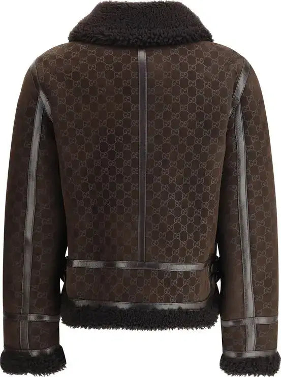 Brown patterned jacket with black fur trim on a white background