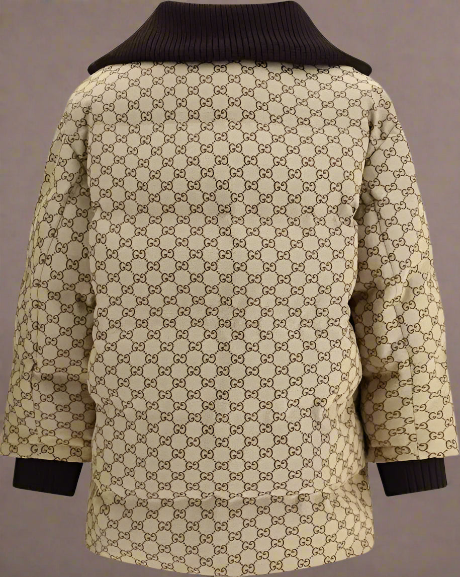 Beige patterned coat with black trim on a white background