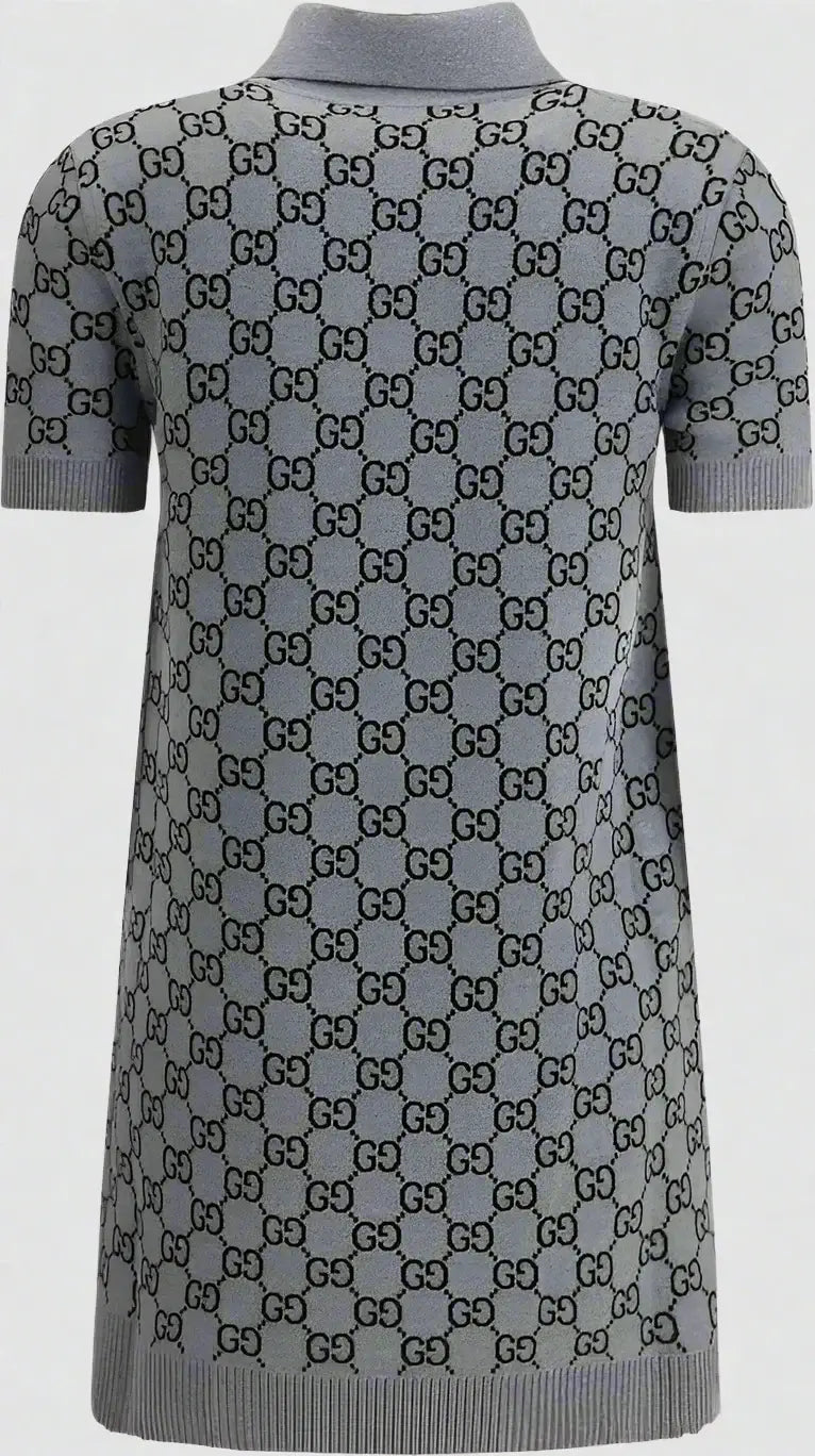 Gray sweater dress with a pattern on a plain background