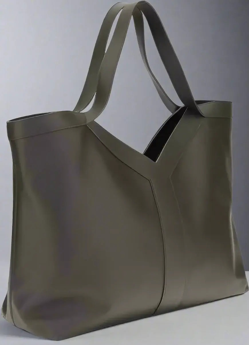 Grey leather tote bag on a white background