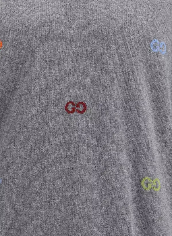 Close-up of a gray fabric with colorful logos.