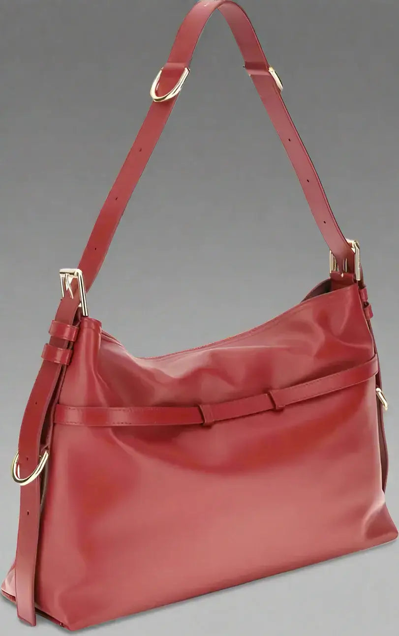Red handbag with gold accents on a white background