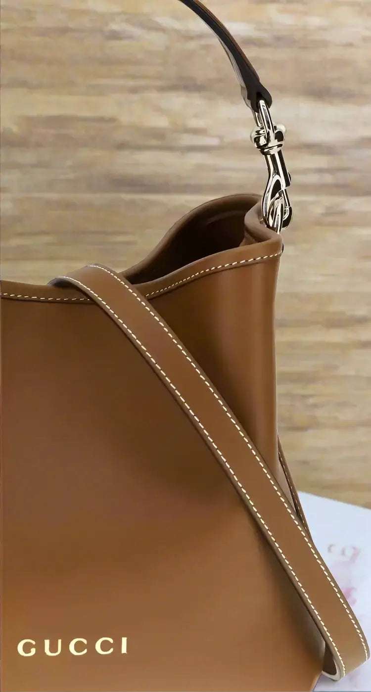 Gucci GG Emblem Leather Bucket Bag
