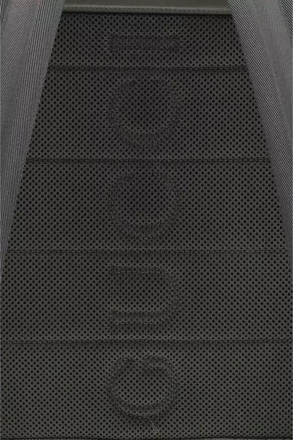 Close-up of a textured black surface with a pattern
