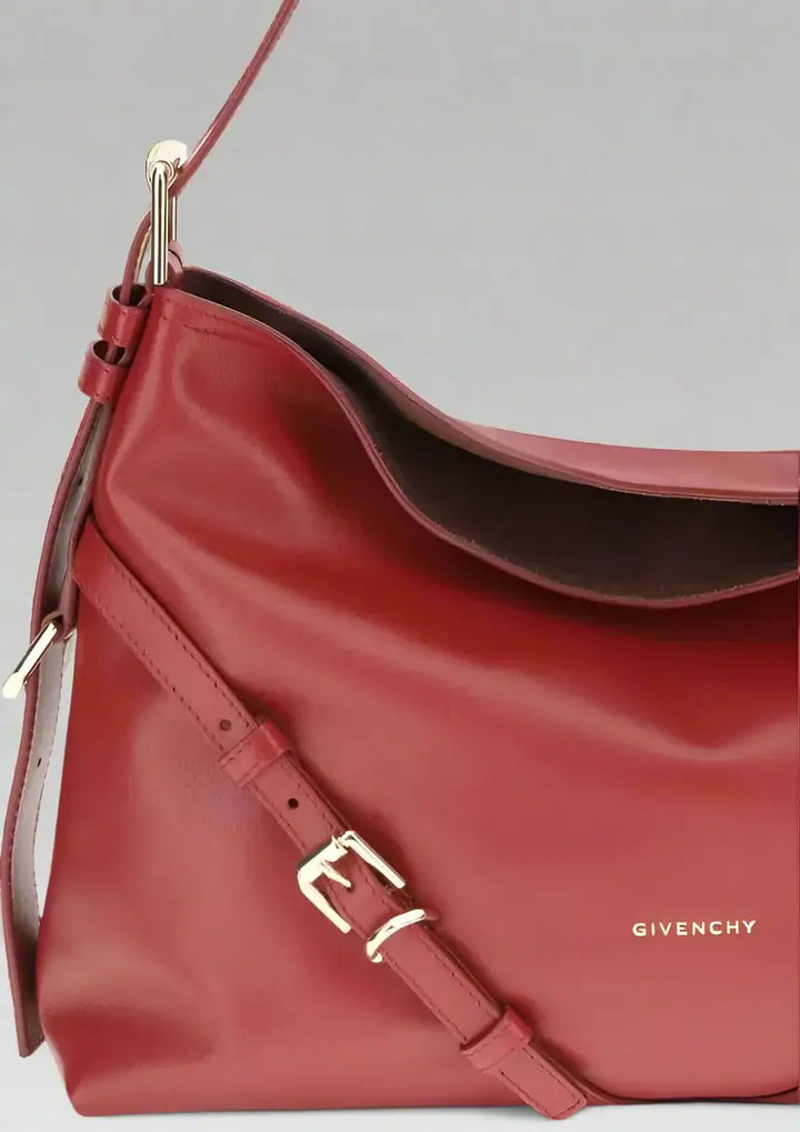 Red Givenchy handbag on a white background
