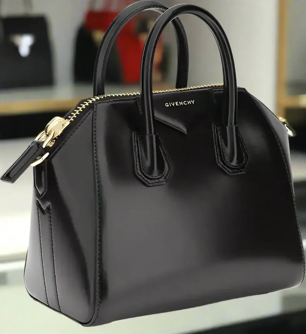 Black Givenchy handbag on a white background