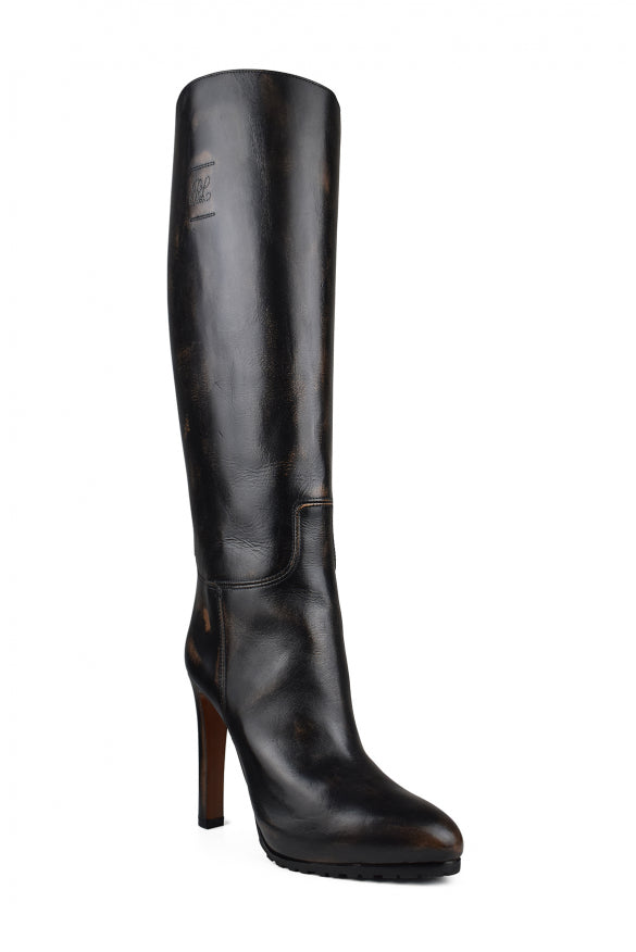 Black knee-high boot on a white background