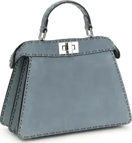Gray handbag with a silver clasp on a white background