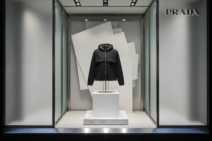 Black jacket with a brand logo on a white background