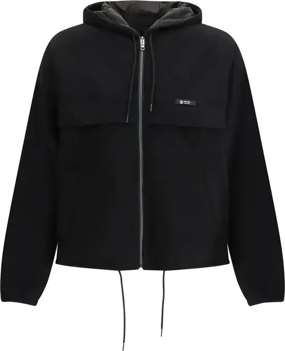 Black jacket with a brand logo on a white background