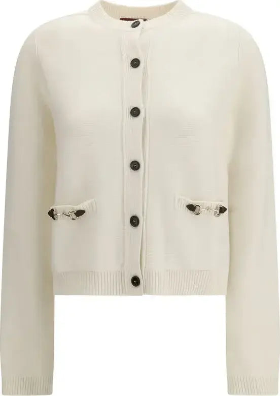 White cardigan with black buttons and trim on a white background