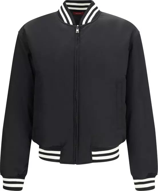 Black bomber jacket with white trim on a white background