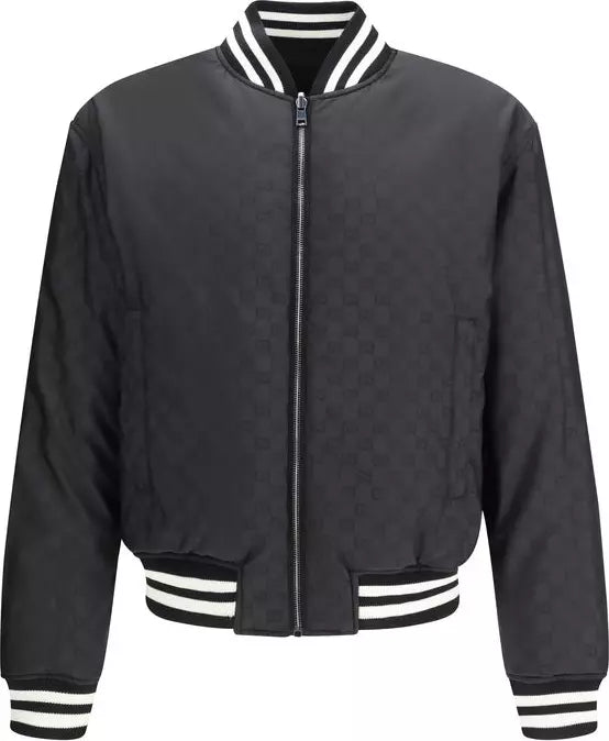 Black bomber jacket with white and black striped trim on a white background
