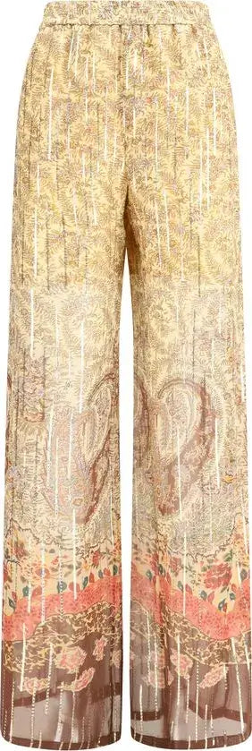Patterned pants with a paisley design on a neutral background