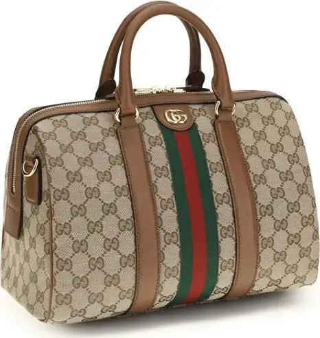 Designer handbag with monogram pattern and colorful stripes on a white background