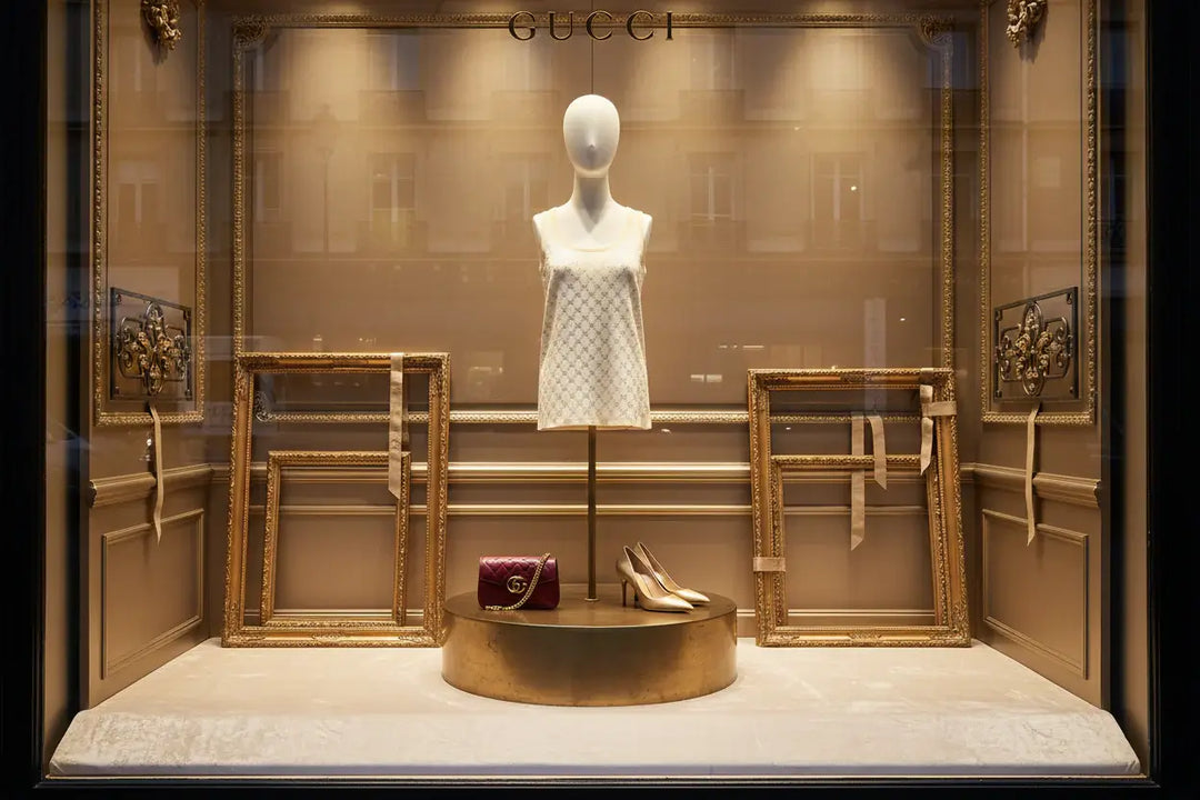 Beige tank top with Gucci logo pattern on a beige background