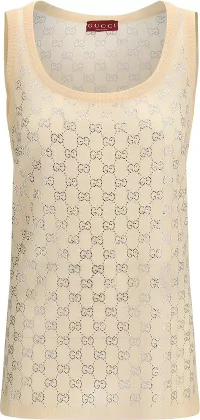 Beige tank top with Gucci logo pattern on a beige background