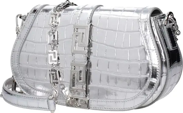 Silver metallic handbag with chain detail on a white background