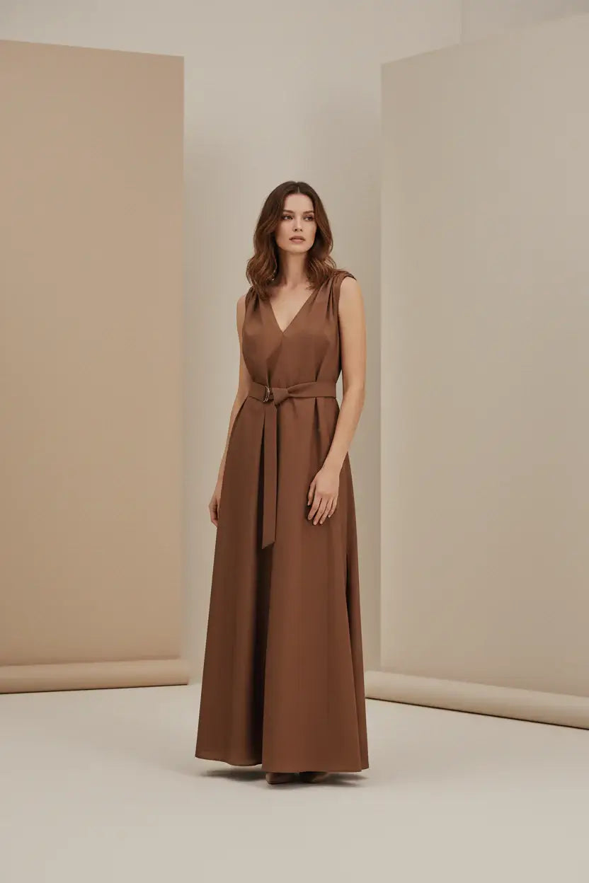 Brown sleeveless dress with a belt on a white background