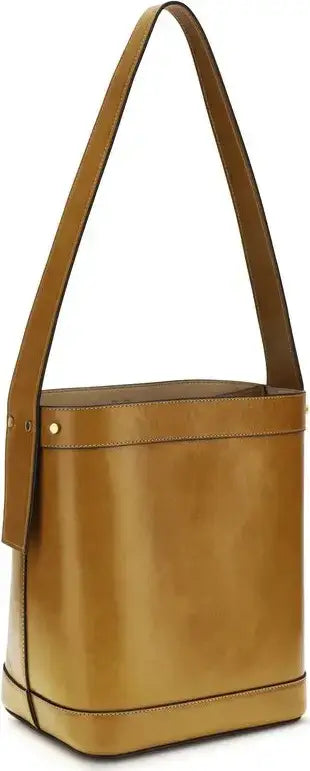 Tan leather handbag with a shoulder strap on a white background