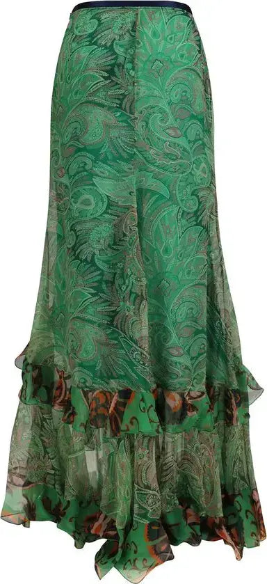 Green patterned skirt with ruffled layers on a plain background