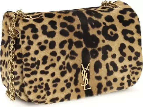 Leopard print handbag with gold chain and YSL logo on a white background
