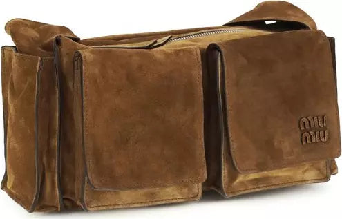 Brown leather bag with a visible brand logo on a white background