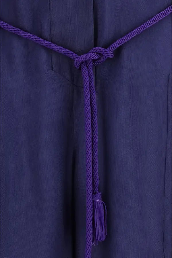 Navy blue garment with a purple cord and tassel