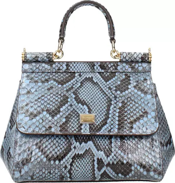 Snake pattern handbag with gold accents on a white background
