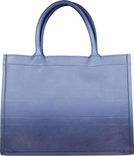A blue tote bag with a smooth leather-like finish and two top handles, shown against a plain white background.