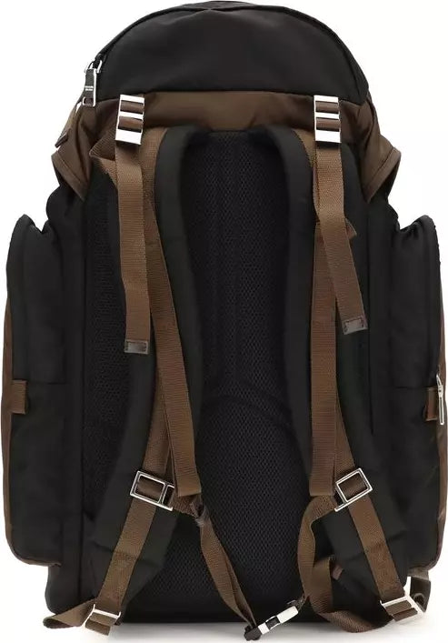 Black backpack with brown straps on a white background